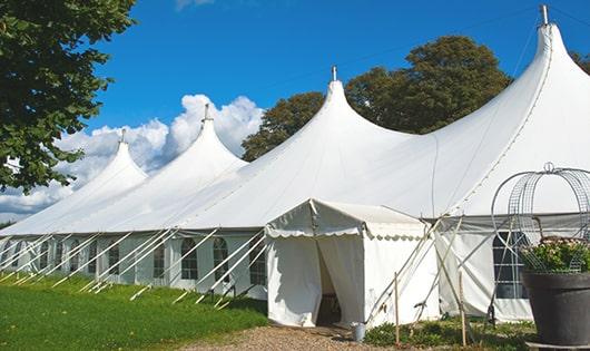 portable restrooms situated at a sports tournament, allowing players and spectators to stay refreshed and clean during breaks in Feeding Hills